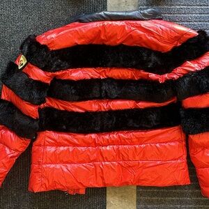 rossignol createur jacket red super fancy 

Only used one time super new !! 

XS